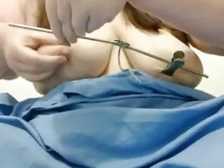 Big bouncy tits receive hard clamping from master BDSM porn
